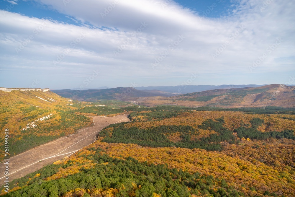Naklejka premium The autumn landscape of the mountain valley is an amazing, beautiful place at any time of the year. Hiking. Nature