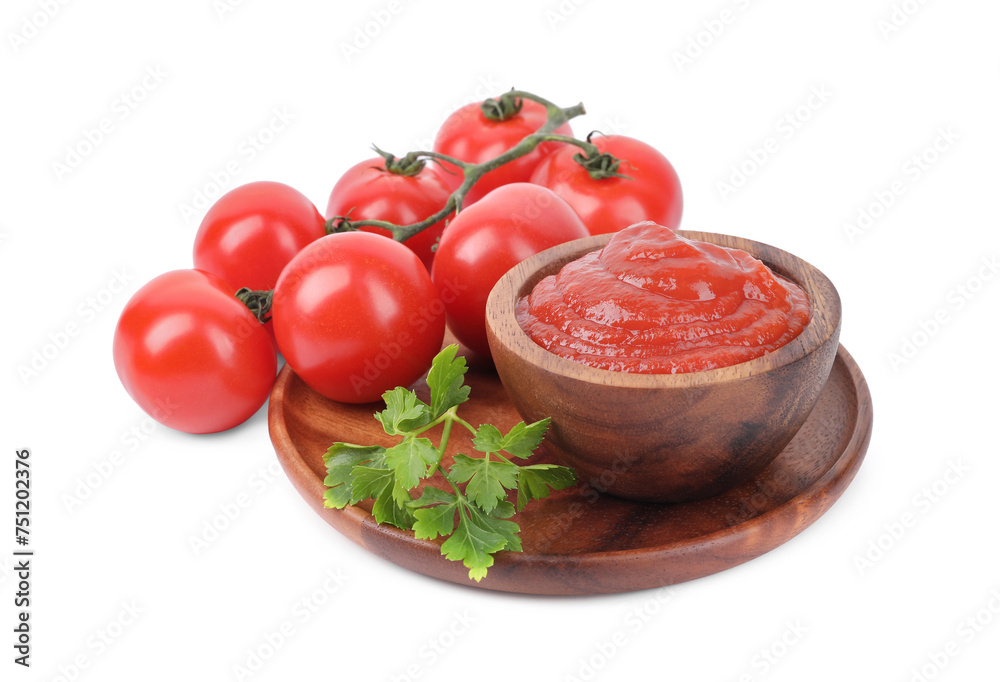 Organic ketchup in bowl, fresh tomatoes and parsley isolated on white. Tomato sauce Organic ketchup in bowl, fresh tomatoes and parsley isolated on white. Tomato sauce