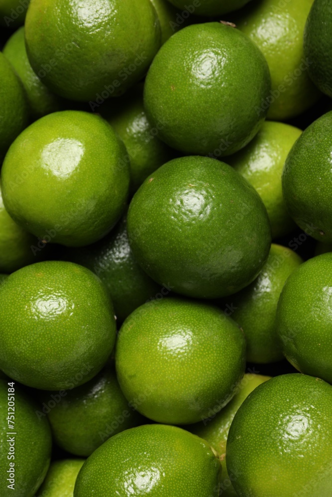 Many fresh ripe limes as background, top view Many fresh ripe limes as background, top view