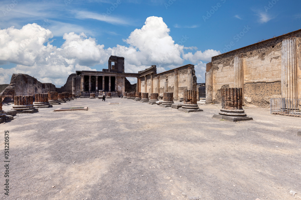 Ruins of an ancient city destroyed by the eruption of the volcano Vesuvius, forum with Basilica, Pompeii, Naples, Italy