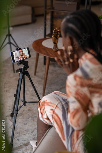 Black female blogger discussing jewelry on blog