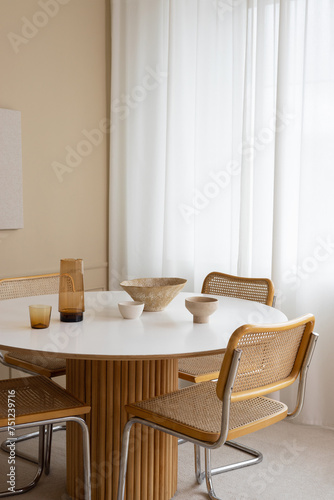 A modern dining room with stylish furniture