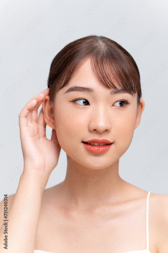 Beauty face of young woman with natural makeup on white Beauty face of young woman with natural makeup on white