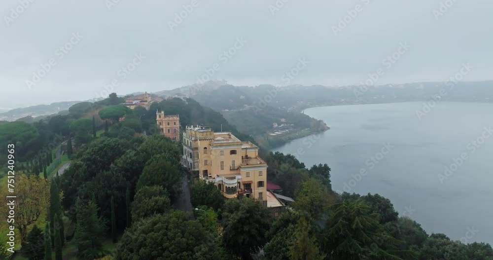 Aerial view of Castel Gandolfo Lake Albano in Italy. The architecture of the tourist city with the papal residence on top of the mountain. High quality 4k footage Aerial view of Castel Gandolfo Lake Albano in Italy. The architecture of the tourist city with the papal residence on top of the mountain. High quality 4k footage