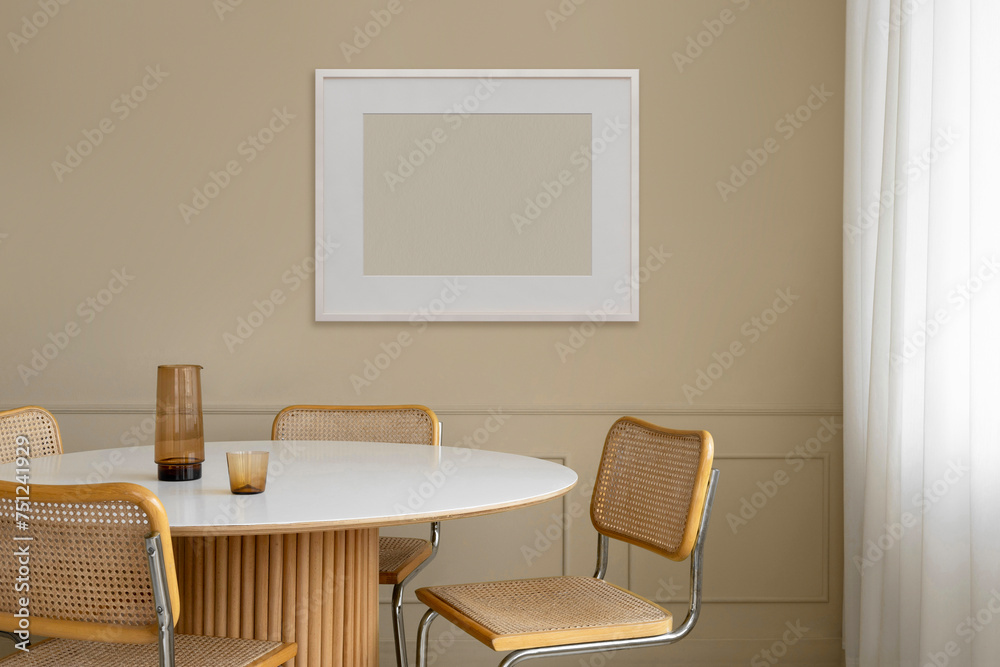 © Artem Podrez/Stocksy - Frame with an empty space against a modern interior