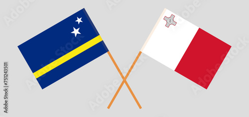 Crossed flags of Country of Curacao and Malta. Official colors. Correct proportion