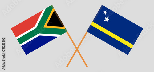 Crossed flags of South Africa and Country of Curacao. Official colors. Correct proportion