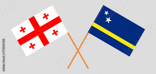 Crossed flags of Georgia and Country of Curacao. Official colors. Correct proportion