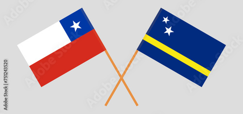 Crossed flags of Chile and Country of Curacao. Official colors. Correct proportion