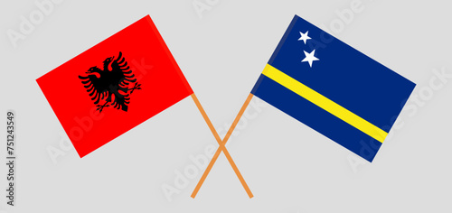 Crossed flags of Albania and Country of Curacao. Official colors. Correct proportion