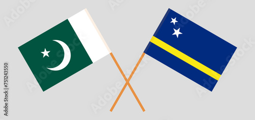 Crossed flags of Pakistan and Country of Curacao. Official colors. Correct proportion