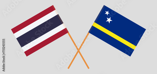 Crossed flags of Thailand and Country of Curacao. Official colors. Correct proportion