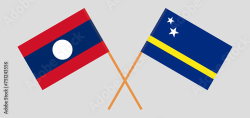 Crossed flags of Laos and Country of Curacao. Official colors. Correct proportion