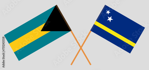 Crossed flags of the Bahamas and Country of Curacao. Official colors. Correct proportion.