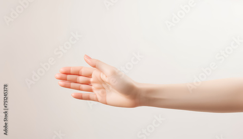 A hand is shown with a white background