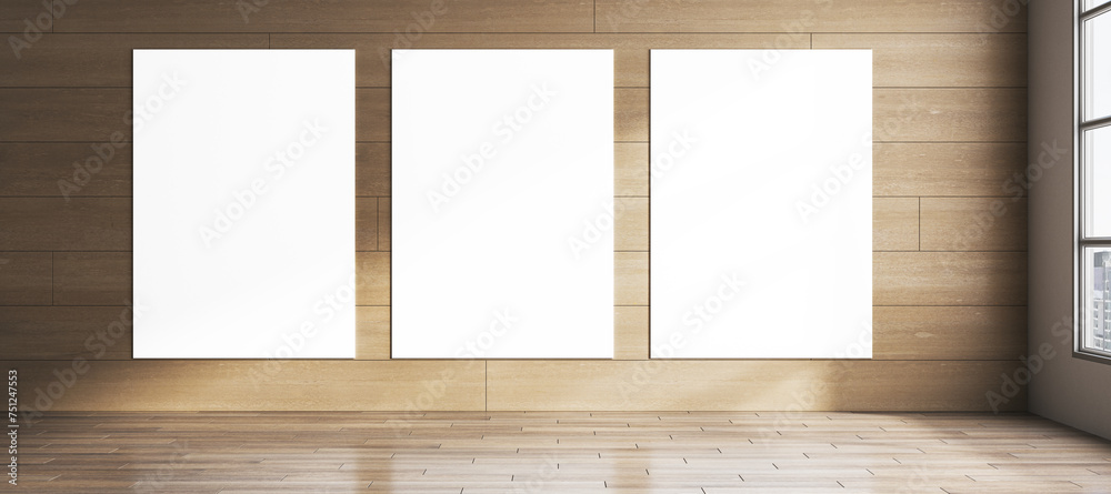 Fototapeta premium Modern wide hardwood room with blank white mock up banners on wall, window and sunlight. 3D Rendering.