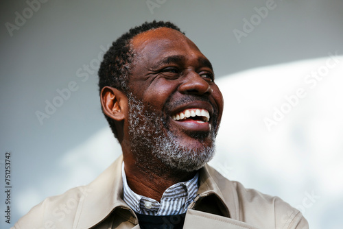 Cheerful businessman in stylish outfit