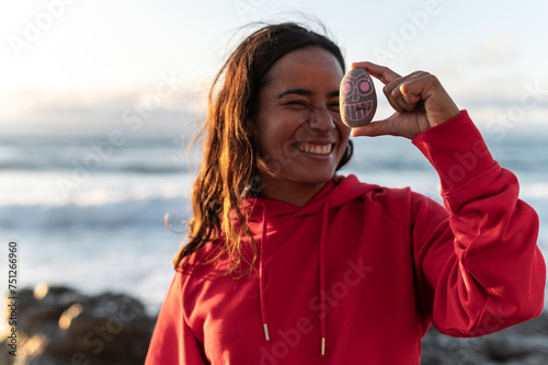 Hispanic woman with good vibes joining time out photo