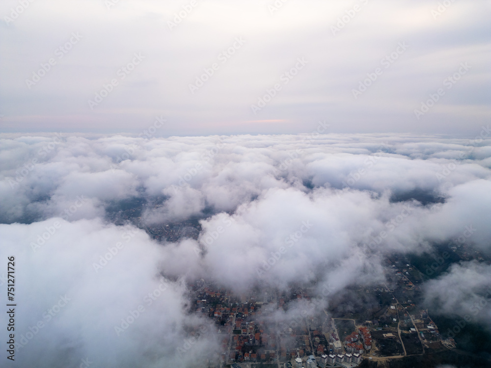 Fototapeta premium Aerial View of Clouds From Airplane