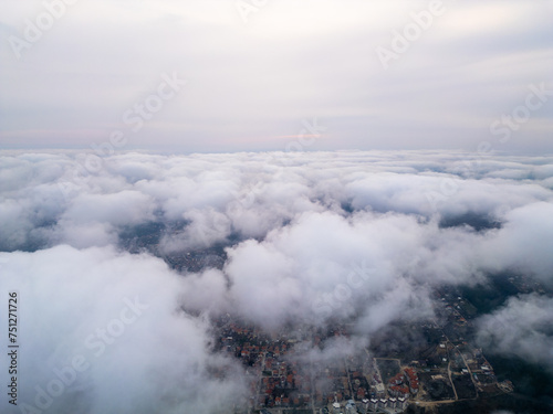 Aerial View of Clouds From Airplane © sandsun