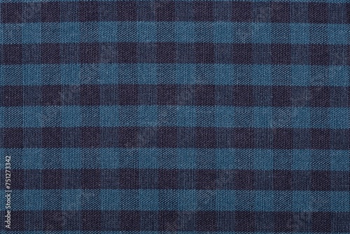 Navy blue checkered fabric a background or texture