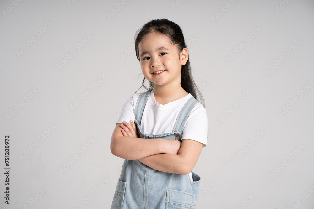 Portrait of a lovely Asian baby girl posing on a white background Portrait of a lovely Asian baby girl posing on a white background