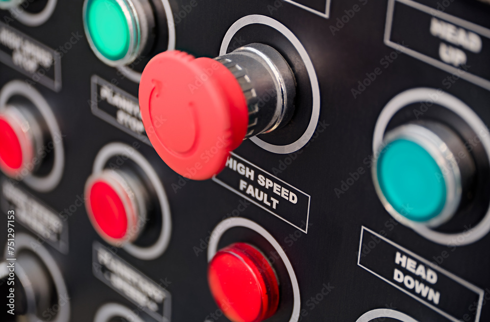 Fototapeta premium Red and green round lamps and buttons on black control panel