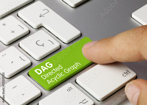 DAG Directed Acyclic Graph - Inscription on Green Keyboard Key.