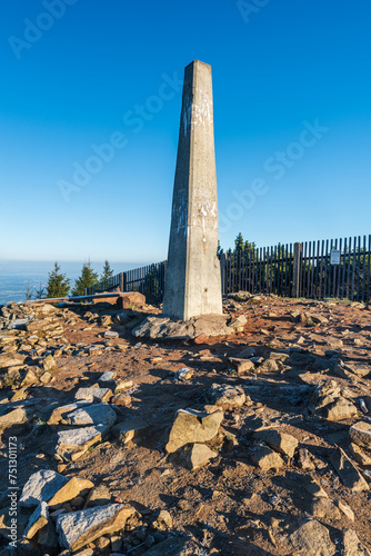 Summit of Lysa hora hill with column in Moravskoslezske Beskydy mountains in Czech republic photo