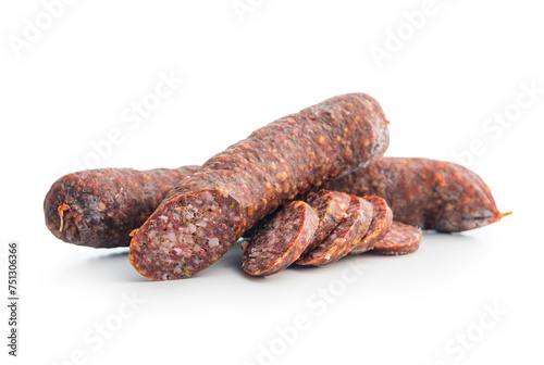 Sliced salami sausage isolated on white background.