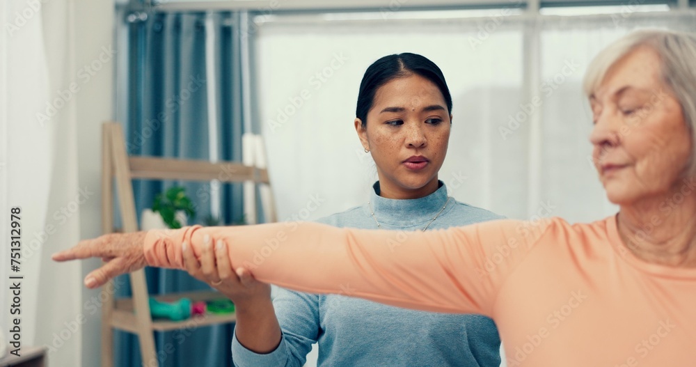 Fototapeta premium Physiotherapy, stretching and senior patient in consultation for support, exam and helping with shoulder in office. Doctor, physiotherapist or nurse with elderly woman for muscle massage or service