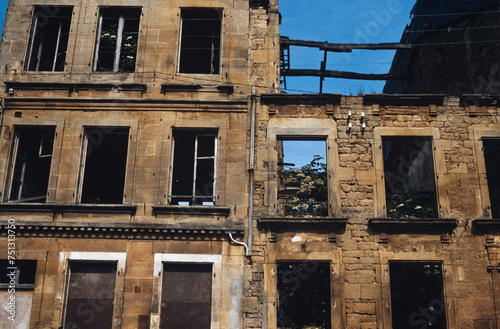 Ruin of burned and abandoned houses at Montmedy in France in the eighties.