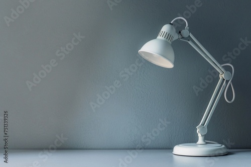 a white lamp on a table © White