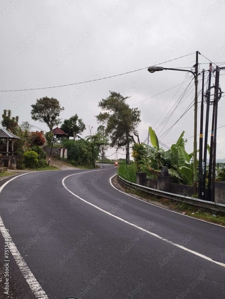 Bali Island 22 May 2023: car on the road when cloudy