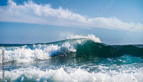 Powerful foamy sea waves rolling and splashing over water surface against cloudy blue sky