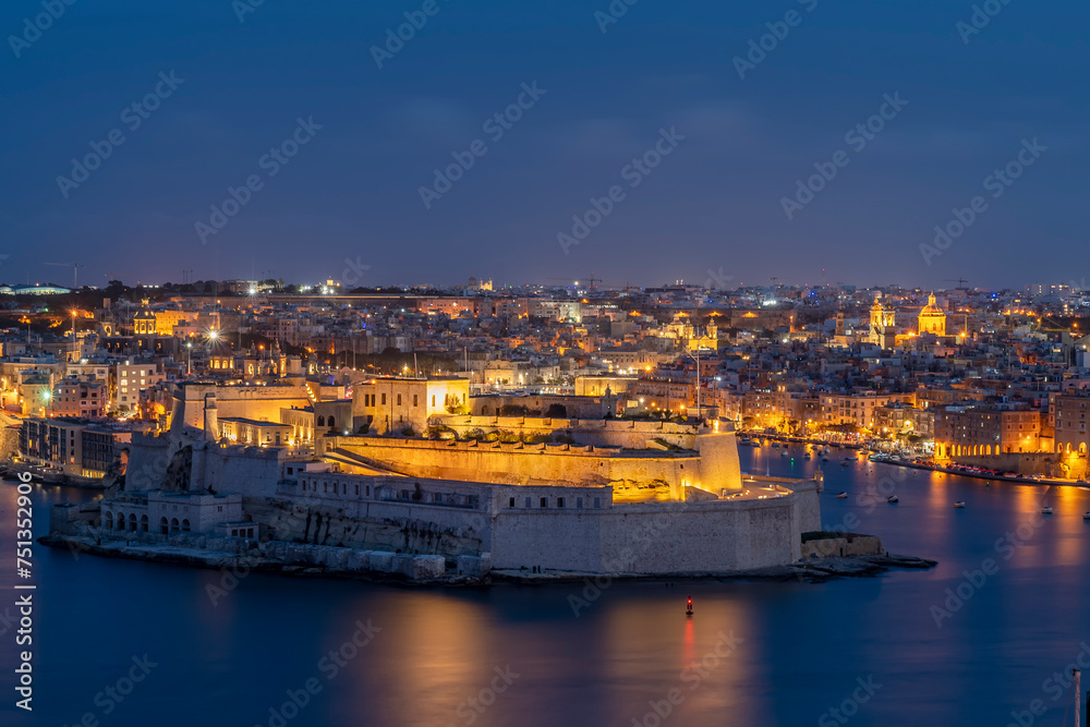 Vittoriosa, also known as Il-Birgu, in twilight, seen from Valletta, Malta