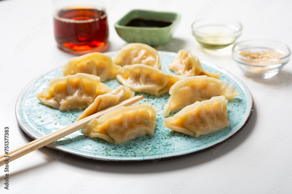 Close up of bolied gyoza chinese dumplings on plate food Close up of bolied gyoza chinese dumplings on plate food