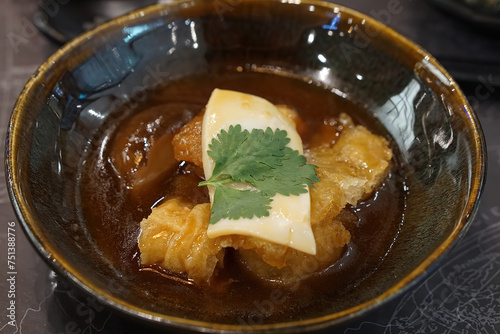 close up top view  maw fish soup with abalone,  Chinese cuisine traditional healthy thick soup