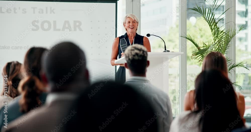 Award, solar presentation and speech with woman talking to audience or crowd at green business event. Meeting, renewable energy workshop and group of people listening to mature business presenter