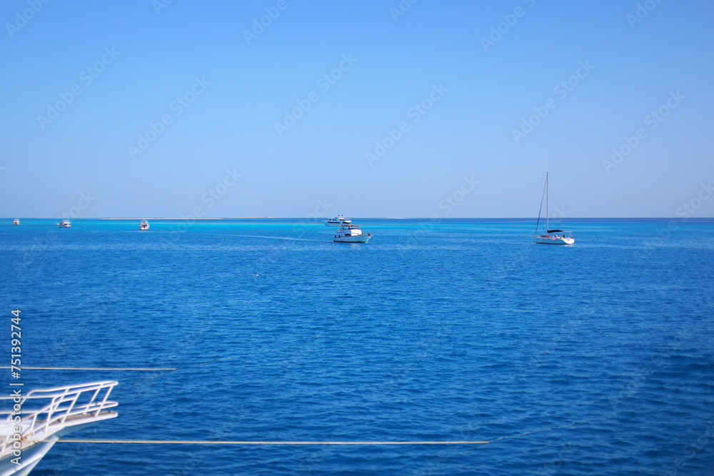 Fototapeta premium Seascape with white yacht sailing the sea