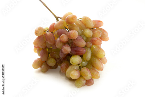 Bunch of organic pink grapes isolated on white background.