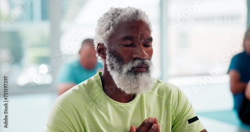 Peace, meditation and black man with yoga, fitness and position in a wellness center and progress. Pensioner, yogi or senior person with workout or exercise with breathing or relax with stress relief photo