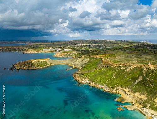Aerial view of Gnejna Bay and sea  stormy winter sky. Maltese island
