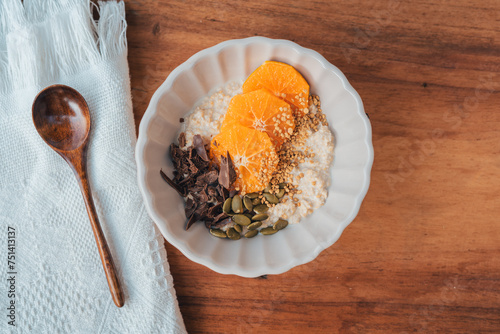 Oatmeal with chocolate orange topping and bee pollen