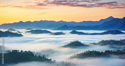 A Captivating View of Fog and Clouds in a Mountain Valley © coco