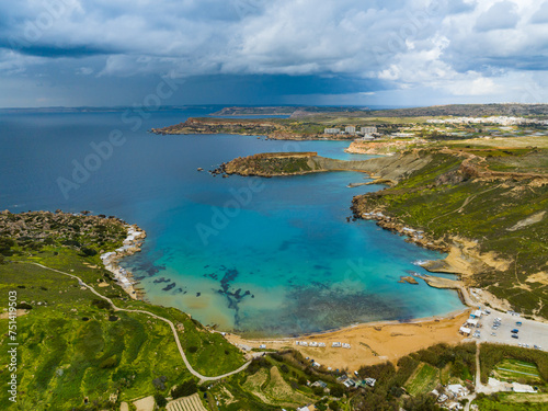 Aerial view of Gnejna Bay and sea, stormy sky. Malta island photo