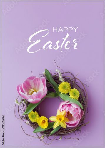 Easter theme, bird nest with delicate spring flowers on pastel background.  photo