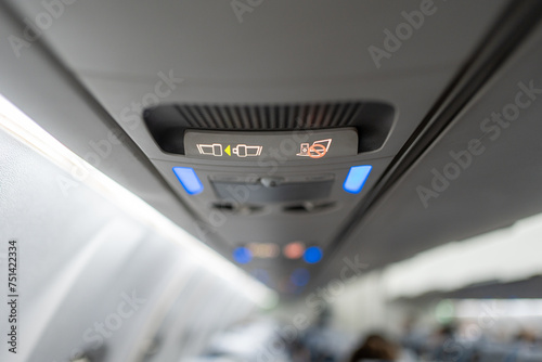 Fasten seat belt sign and prohibit the use of any electronic devices While the plane is taking off or landing