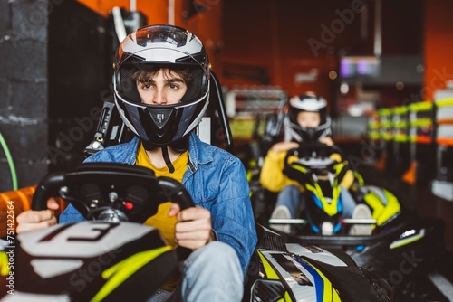 Go-Kart Racers Drive group of young people competing in the shopping center