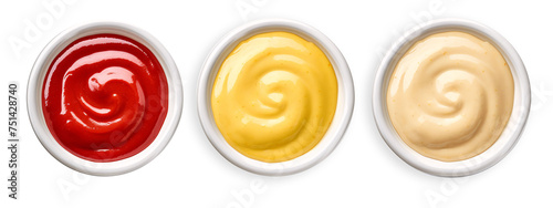 Mayonnaise, mustard and tomato sauces in white bowls. File contains clipping path. Transparent Background